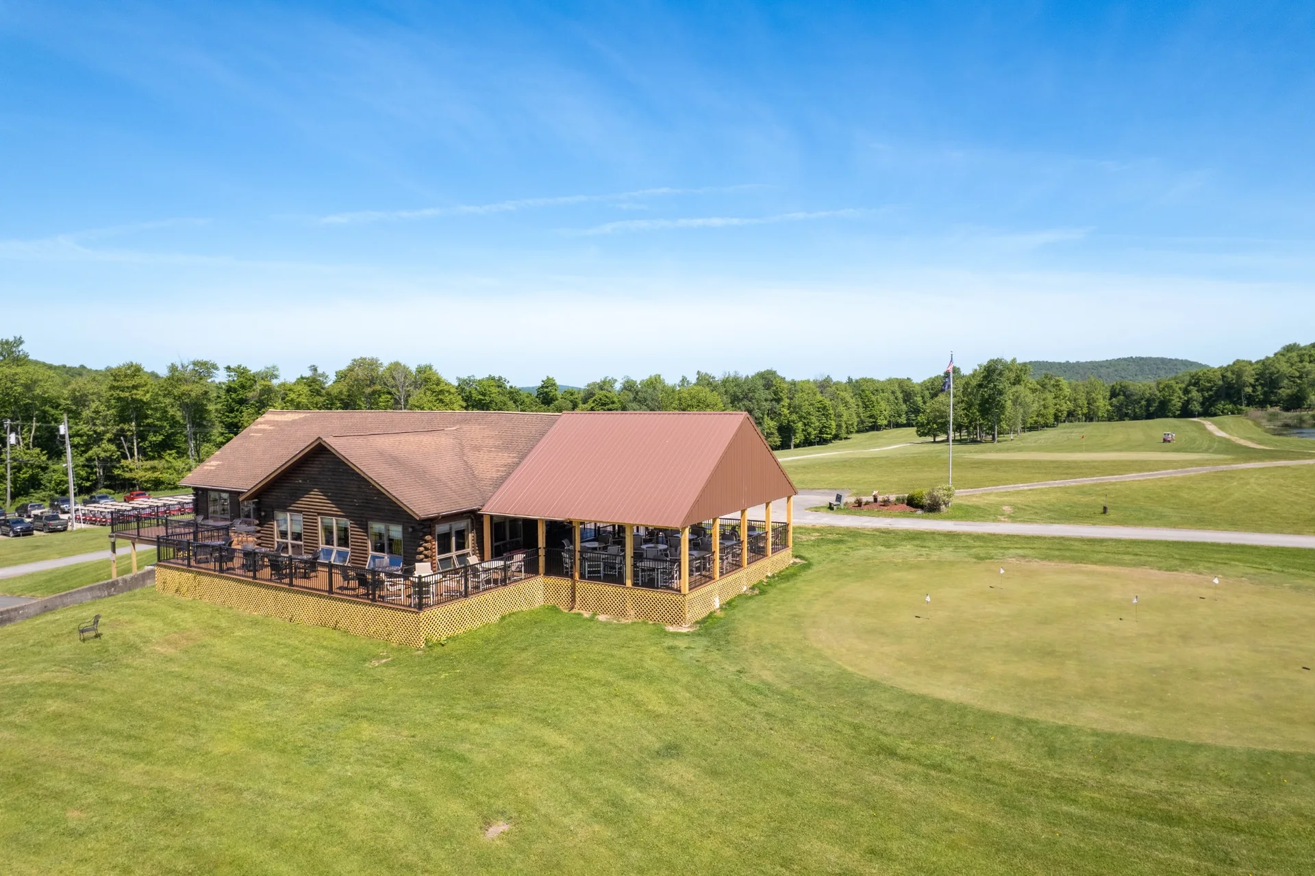 Clubhouse beside the putting green and golf course