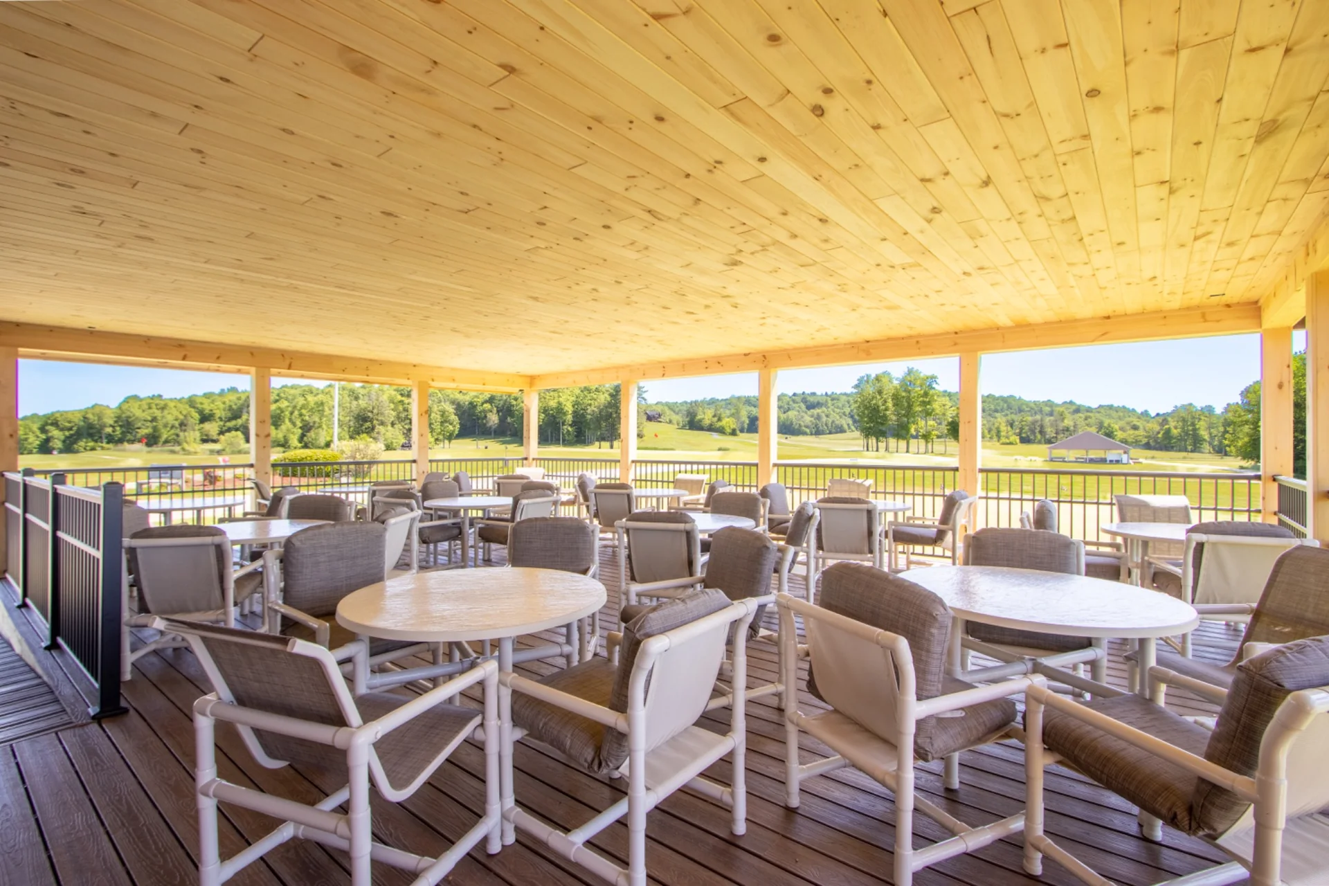 New covered outdoor dining area overlooking the course