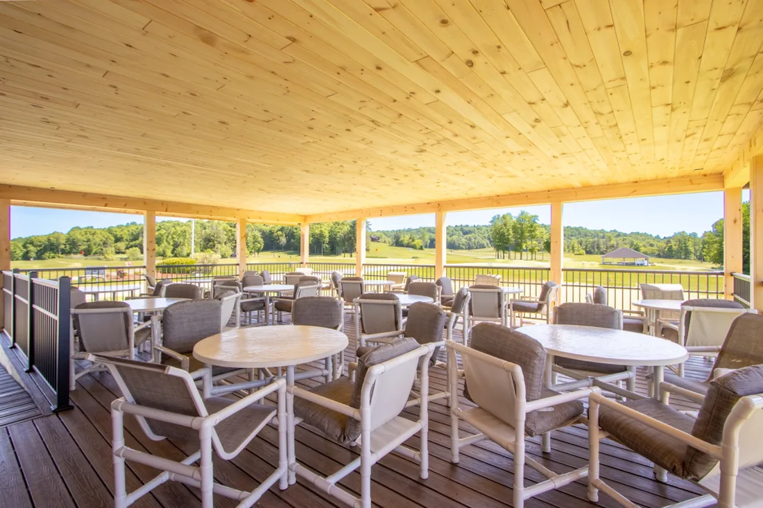New covered outdoor dining area overlooking the course
